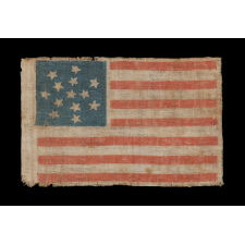 RARE 13 STAR PARADE FLAG DATING TO THE CIVIL WAR PERIOD (1861-65) OR PRIOR, WITH AN EXCEPTIONALLY RARE AND BEAUTIFUL SNOWFLAKE MEDALLION CONFIGURATION OF 13 STARS