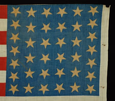 RARE 38 STAR ANTIQUE AMERICAN PARADE FLAG WITH "1876 CENTENNIAL" ADVERTISING & GOLD STARS, MADE FOR THE 1876 CENTENNIAL INTERNATIONAL EXPOSITION IN PHILADELPHIA