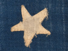 RARE INDIAN WARS PERIOD UNION INFANTRY BATTLE FLAG WITH 40 STARS IN A NOTCHED CONFIGURATION AND WITH A CANDY-STRIPE FRINGE, AN UNOFFICIAL STAR COUNT, ACCURATE FOR JUST 6 DAYS, NOVEMBER 2ND - 6TH, 1889, PROBABLY MADE ON THE GREAT PLAINS