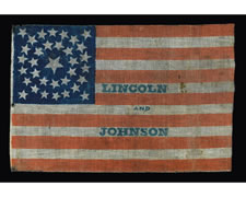 RARE PARADE FLAG MADE FOR THE 1864 CAMPAIGN OF REPUBLICAN CANDIDATES ABRAHAM LINCOLN & ANDREW JOHNSON, WITH 34 STARS IN A DOUBLE WREATH CONFIGURATION AND BLUE TEXT