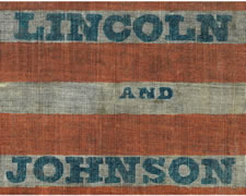 RARE PARADE FLAG MADE FOR THE 1864 CAMPAIGN OF REPUBLICAN CANDIDATES ABRAHAM LINCOLN & ANDREW JOHNSON, WITH 34 STARS IN A DOUBLE WREATH CONFIGURATION AND BLUE TEXT