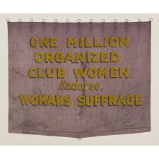 RARE VIOLET & YELLOW SUFFRAGETTE PARADE BANNER WITH PAINTED TEXT THAT READS: “ONE MILLION ORGANIZED CLUB WOMEN ENDORSE, WOMANS SUFFRAGE.” MADE circa 1910-1920, THIS IS THE PLATE EXAMPLE FROM THE BEST PICTORIAL REFERENCE ON SUFFRAGE COLLECTING