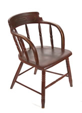 SET OF 12 BARREL-BACK WINDSOR CHAIRS, IN RED PAINT, WITH THE 3-LINK CHAIN (FRIENDSHIP, LOVE, AND TRUTH) OF THE ODD FELLOWS ON EACH CREST RAIL, CA 1850-70