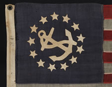 THE SMALLEST PRIVATE YACHT ENSIGN I HAVE EVER SEEN WITH HAND-SEWN STARS AND A CANTED ANCHOR, 1876-1890