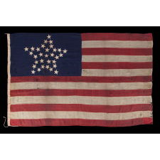 SPECTACULAR ANTIQUE AMERICAN FLAG WITH 31 STARS ARRANGED IN THE "GREAT STAR" PATTERN; ITS CANTON RESTING THE WAR STRIPE, 1850- 1858, CALIFORNIA STATEHOOD