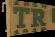 TRIANGULAR FELT PENNANT COMMEMORATING THE LIFE OF THEODORE ROOSEVELT, 1858-1919, OYSTER BAY, NEW YORK, WITH STRONG GRAPHICS AND APPEALING, SATURATED COLORS