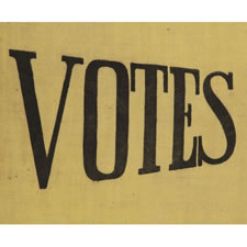 TRIANGULAR SUFFRAGETTE PENNANT WITH A CRUDE, PULLED WORK FRINGE AND TEXT THAT READS:  "VOTES FOR WOMEN", 1910-1920