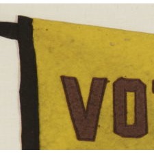 TRIANGULAR, YELLOW, SUFFRAGETTE PENNANT WITH VIOLET "VOTES FOR WOMEN" TEXT, A BLACK BINDING & TIES, AND A GOLD PIN-BACK AFFIXED TO THE HOIST END, CA 1910-1920