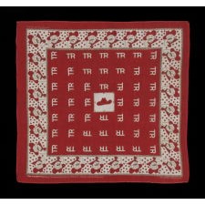 TURKEY RED KERCHIEF, MADE FOR THE 1912 CAMPAIGN OF TEDDY ROOSEVELT, WITH HIS ROUGH RIDERS SLOUCH HAT AS A CENTER MEDALLION AND WHIMSICAL PORTRAITS OF THE EX-ROUGH RIDER WITH HIS ICONIC, TOOTHY GRIN