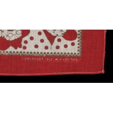 TURKEY RED KERCHIEF, MADE FOR THE 1912 CAMPAIGN OF TEDDY ROOSEVELT, WITH HIS ROUGH RIDERS SLOUCH HAT AS A CENTER MEDALLION AND WHIMSICAL PORTRAITS OF THE EX-ROUGH RIDER WITH HIS ICONIC, TOOTHY GRIN