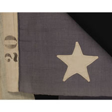 TWENTY-FOOT U.S. NAVY COMMISSIONING PENNANT WITH 13 STARS IN A TWO ROW ARRANGEMENT ON A DUSTY BLUE CANTON, WITH A PRESENTATION INSCRIPTION, 1876 - 1892