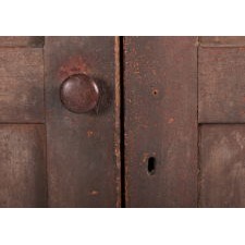 TWO-DOOR MAINE JELLY CUPBOARD, IN OXBLOOD RED PAINT, WITH EXCEPTIONAL PATINA, ca 1830