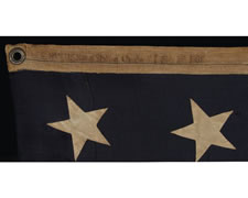 UNITED STATES NAVY SMALL BOAT ENSIGN WITH 13 HAND-SEWN STARS, MADE BY THE NAVY IN THE PHILIPPINES IN FEBRUARY OF 1902