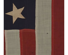 UNITED STATES NAVY SMALL BOAT ENSIGN WITH 13 HAND-SEWN STARS, MADE BY THE NAVY IN THE PHILIPPINES IN FEBRUARY OF 1902