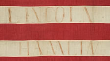 VERY RARE SEWN FLAG WITH 5 STARS ON A BLUE CALICO CANTON AND 8 STRIPES, MADE FOR THE 1860 CAMPAIGN OF ABRAHAM LINCOLN & HANNIBAL HAMLIN, WITH SPECIFIC HISTORY TO A PITTSBURG AREA FAMILY, SAID TO HAVE BEEN CARRIED IN A TORCHLIT PARADE