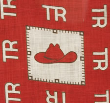 WHIMSICAL TURKEY RED KERCHIEF MADE FOR THE 1912 (PROGRESSIVE PARTY) CAMPAIGN OF TEDDY ROOSEVELT, WITH HIS FAMOUS SLOUCH HAT AS A CENTER MEDALLION