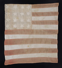 WWI, BELGIAN-MADE FLAG WITH 16 STARS AND ITS CANTON RESTING ON THE WAR STRIPE, USED TO WELCOME U.S. SOLDIERS AFTER LIBERATION FROM THE GERMANS, 1918