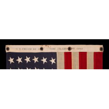 AMERICAN FLAG, 48 STARS, A U.S. NAVY SMALL BOAT ENSIGN, MADE IN SEPTEMBER OF 1943, DURING WWII, AT MARE ISLAND, CALIFORNIA, HEADQUARTERS OF THE PACIFIC FLEET, WITH ENDEARING WEAR FROM OBVIOUS LONG-TERM USE