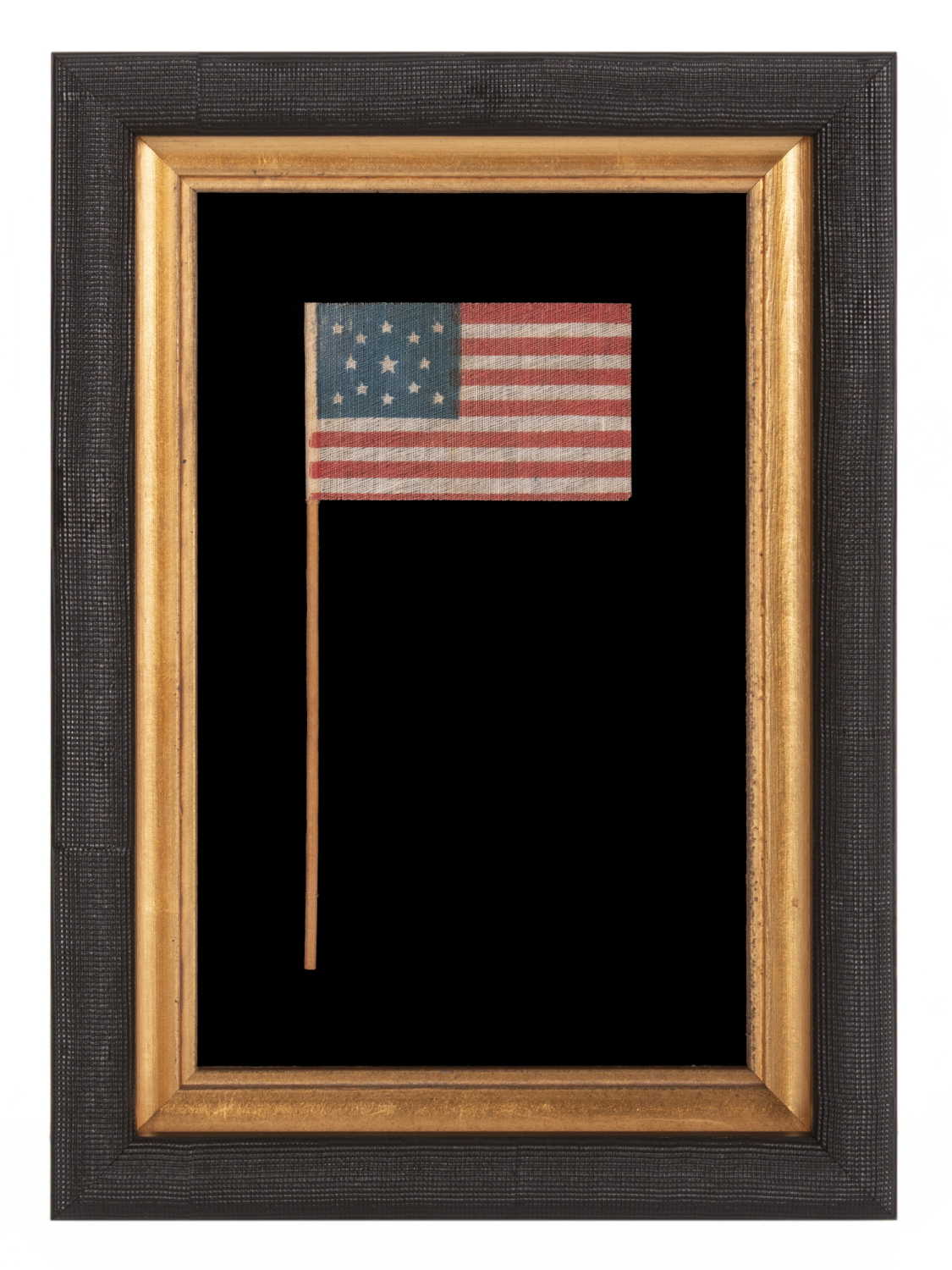 13 STAR ANTIQUE AMERICAN FLAG WITH A MEDALLION CONFIGURATION OF STARS, MADE FOR THE 1876 CENTENNIAL CELEBRATION