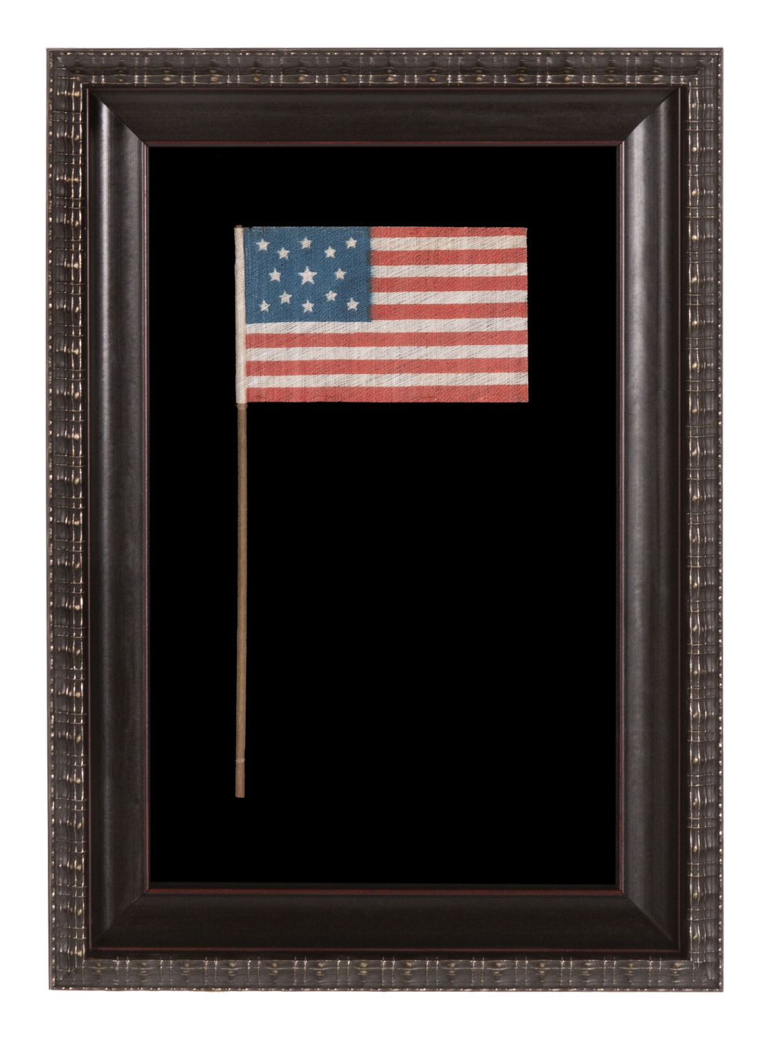 13 STAR ANTIQUE AMERICAN FLAG WITH A MEDALLION CONFIGURATION OF STARS, MADE FOR THE 1876 CENTENNIAL CELEBRATION