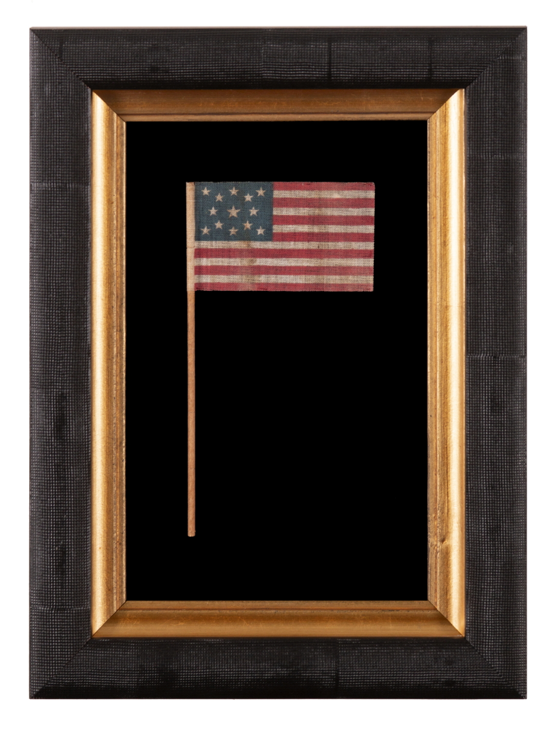 13 STAR ANTIQUE AMERICAN FLAG WITH A MEDALLION CONFIGURATION OF STARS, MADE FOR THE 1876 CENTENNIAL CELEBRATION
