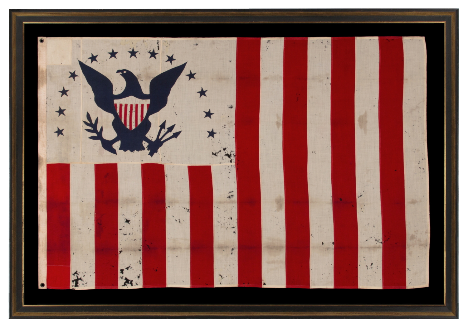 LATE 19th CENTURY FLAG OF THE REVENUE MARINE (a.k.a., REVENUE CUTTER SERVICE), WITH A BLUE EAGLE AMID AN ARCH OF 13 BLUE STARS, ON A WHITE CANTON, AND 16 RED & WHITE, VERTICAL STRIPES, MADE circa 1885-1895