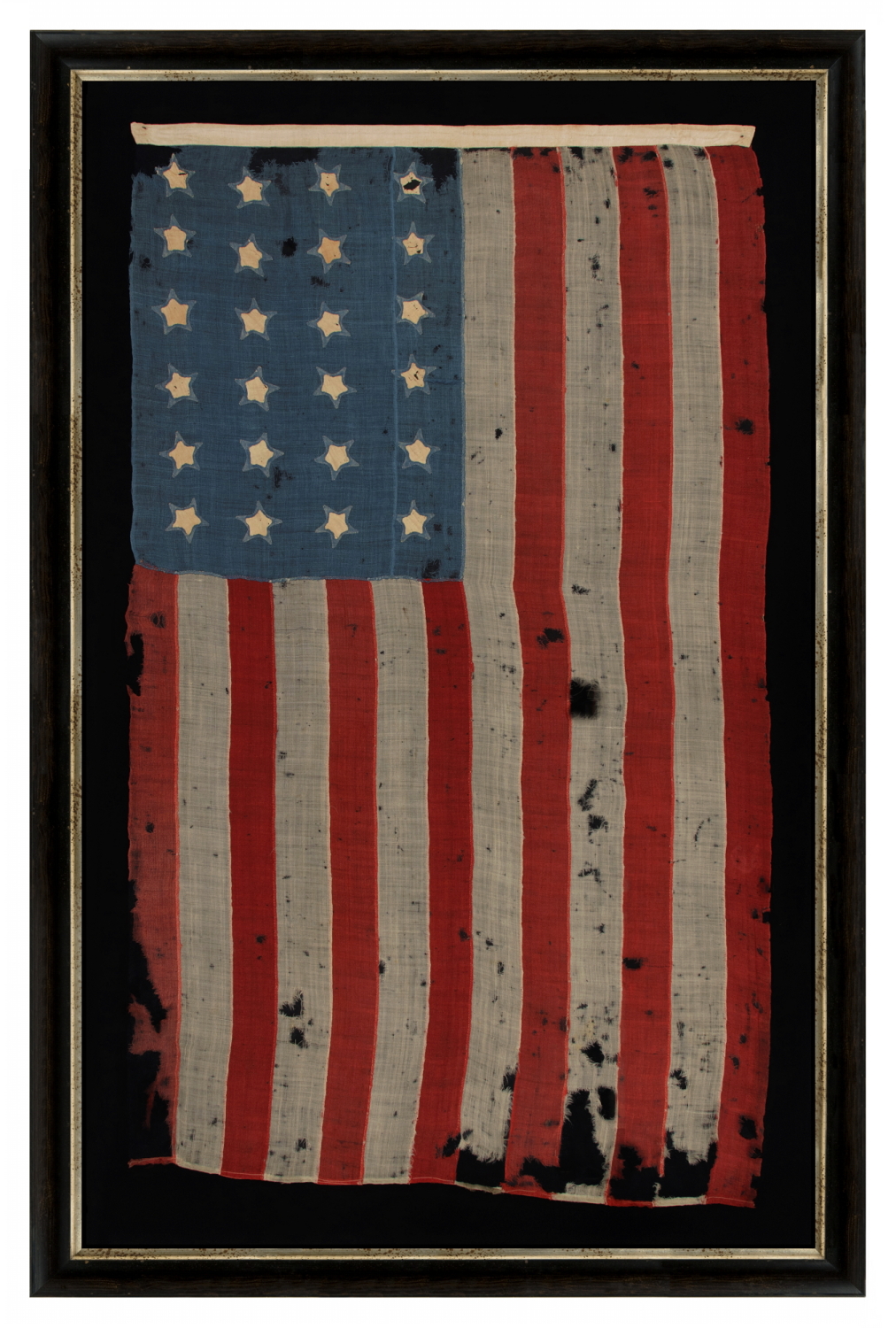 24 STAR ANTIQUE AMERICAN FLAG, MADE IN THE PERIOD WHEN MISSOURI WAS THE MOST RECENT STATE TO JOIN THE UNION, 1821-1836; AN EXTREMELY RARE STAR COUNT; EXPERTLY SEWN, BUT WITH HIGHLY UNUSUAL, SINGLE-APPLIQUED STARS THAT EXPOSE A PECULIARLY SMALL WINDOW ON THE REVERSE; EXHIBITED JUNE- SEPTEMBER, 2021 AT THE MUSEUM OF THE AMERICAN REVOLUTION