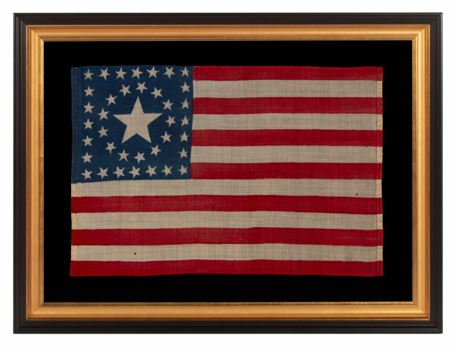 38 STARS IN A RARE AND STRIKING CIRCLE-IN-A-SQUARE MEDALLION, WITH AN ENORMOUS CENTER STAR, MADE FOR THE 1876 CENTENNIAL CELEBRATION BY HORSTMANN BROTHERS OF PHILADELPHIA, A MAJOR MILITARY OUTFITTER