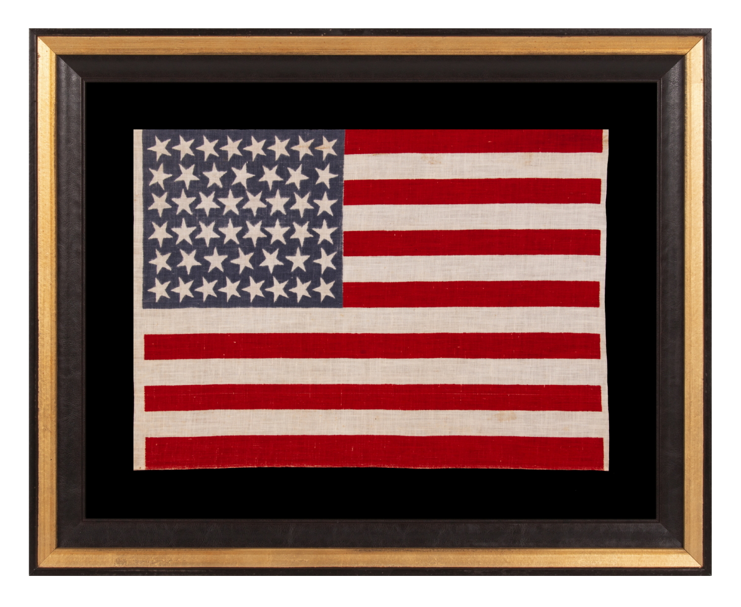 46 STAR ANTIQUE AMERICAN FLAG WITH VARIED STAR POSITIONING, A SCARCE AND BEAUTIFUL EXAMPLE; REFLECTS THE PERIOD WHEN OKLAHOMA WAS THE MOST RECENT STATE TO JOIN THE UNION, circa 1907-1912