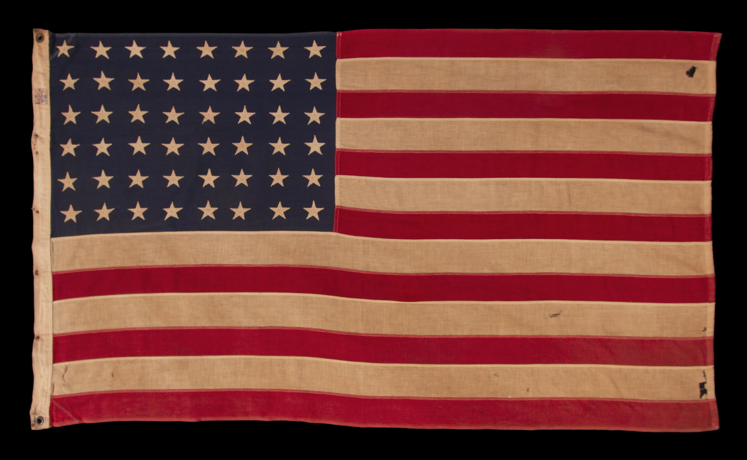 48 STAR, VINTAGE AMERICAN FLAG WITH AN EARLY “STORM KING” LABEL, ATTRIBUTED TO THE “OLD GLORY” FLAG CO. OF CHICAGO, OR COLLEGEVILLE FLAG & MFG. CO. OF PENNSYLVANIA, circa 1935-1950