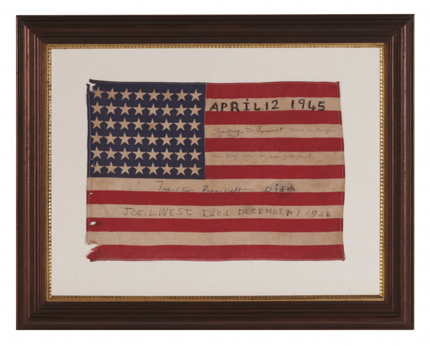 48 STARS ON ANTIQUE AMERICAN FLAG WITH HAND-WRITTEN INSCRIPTIONS AND AN EMBROIDERED DATE OF APRIL 12TH, 1945, MOURNING THE DEATH OF PRESIDENT FRANKLIN DELANO ROOSEVELT