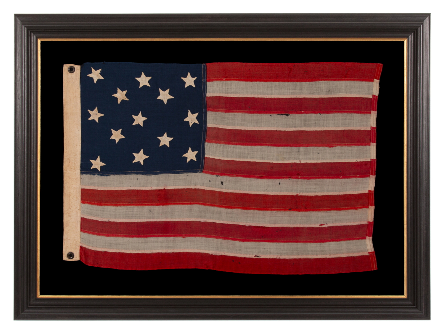 ANTIQUE AMERICAN FLAG WITH 13 HAND-SEWN STARS IN A 3-2-3-2-3 CONFIGURATION, MADE IN THE ERA OF THE 1876 CENTENNIAL OF AMERICAN INDEPENDENCE, IN AN EXTRAORDINARY AND VERY DESIRABLE SIZE AMONG ITS COUNTERPARTS