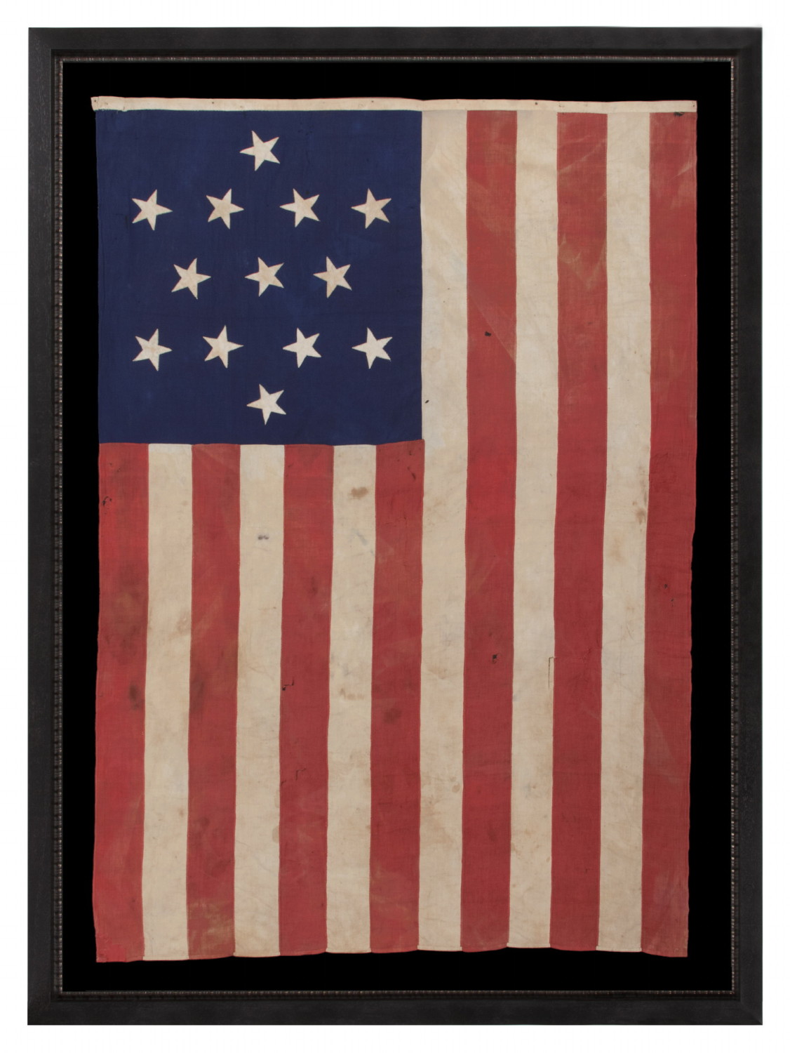 ENTIRELY HAND-SEWN 13 STAR FLAG WITH A 6-POINTED GREAT STAR / STAR OF DAVID PATTERN, ONE OF A TINY HANDFUL OF PIECED-AND-SEWN EXAMPLES WITH THIS EXTRAORDINARILY RARE STAR DESIGN, MADE DURING THE CIVIL WAR ERA