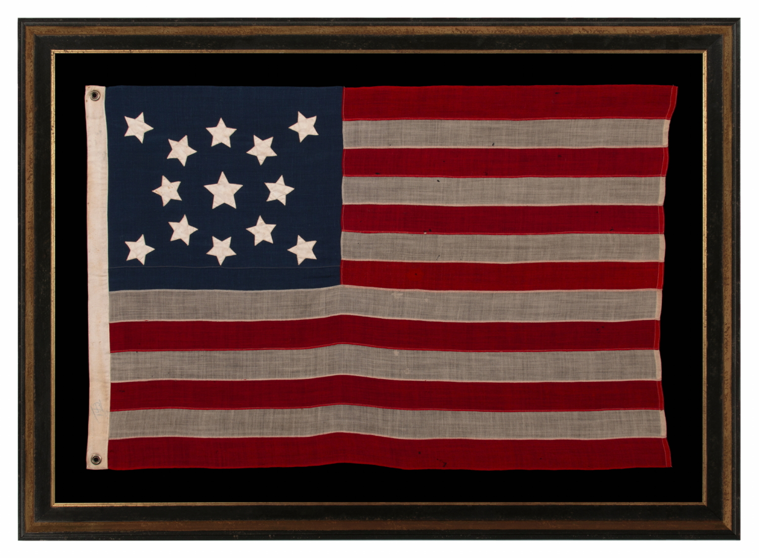 13 STARS IN A MEDALLION CONFIGURATION ON AN ANTIQUE AMERICAN FLAG WITH A MEDALLION CONFIGURATION OF 13 STARS, A SMALL-SCALE EXAMPLE MADE DURING THE LAST DECADE OF THE 19th CENTURY