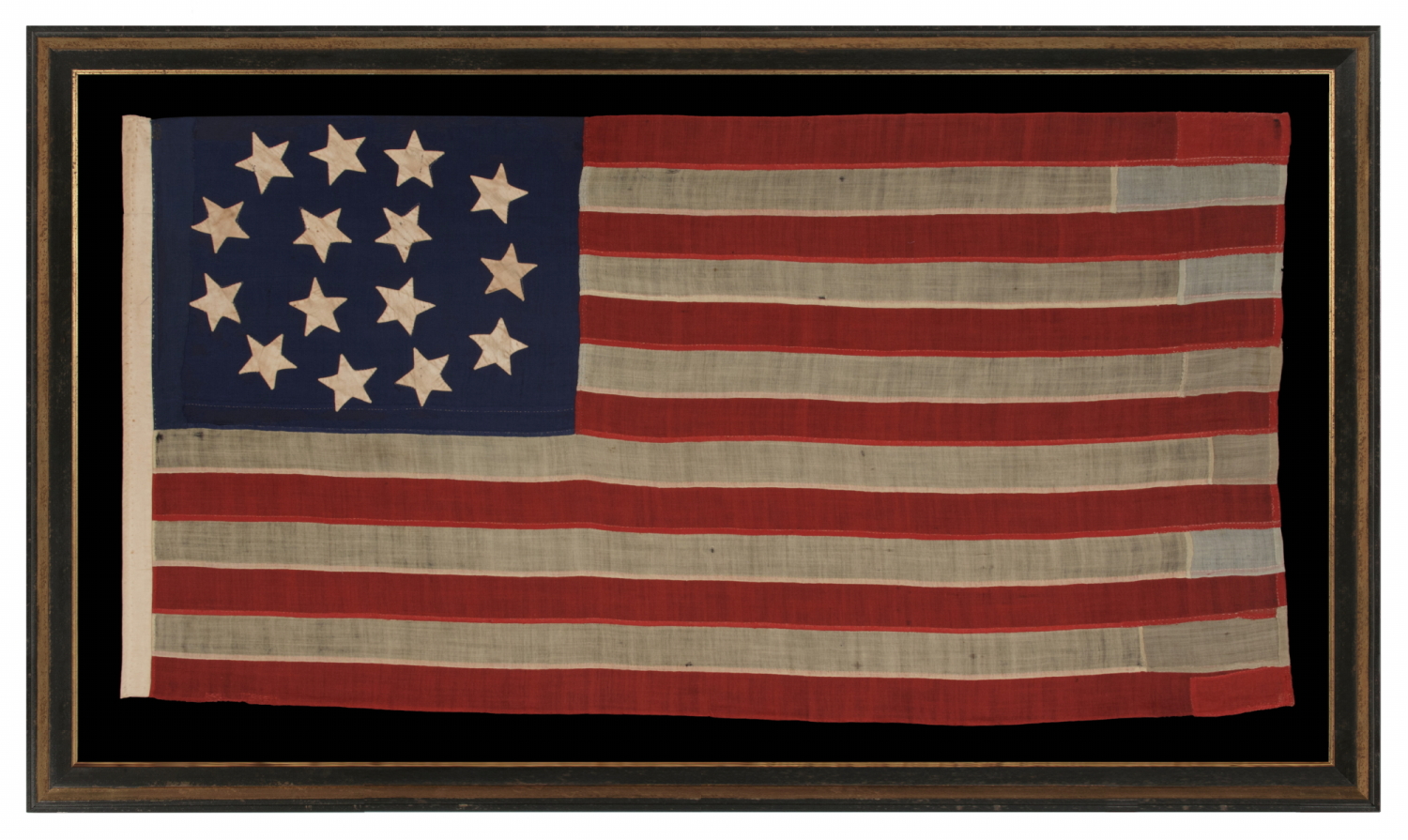 15 STARS IN AN EXTRAORDINARY ARRANGEMENT THAT CONSISTS OF AN OVAL WREATH OF 11, SURROUNDING A SQUARE OF 4; A UNIQUE & ENTIRELY HAND-SEWN, ANTIQUE AMERICAN FLAG MADE WITH SOUTHERN SYMPATHIES, REMOVING THE FREE STATES FROM THE STAR COUNT, LIKELY circa 1861: