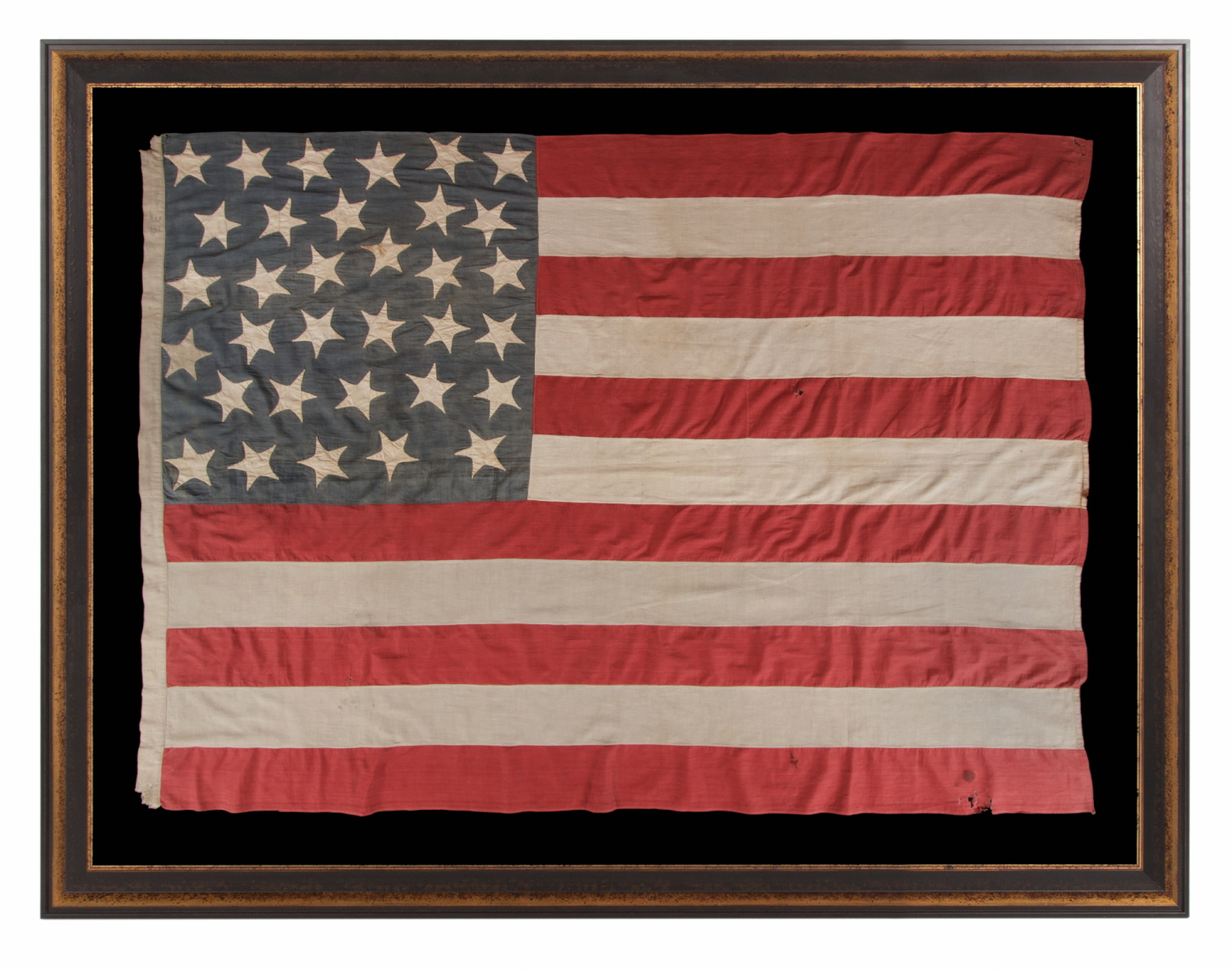 33 HAPHAZARDLY PLACED STARS AND 11 STRIPES ON AN ANTIQUE AMERICAN FLAG WITH ITS CANTON RESTING ON THE WAR STRIPE, POSSIBLY MADE WITH SOUTHERN SYMPATHIES; REFLECTS THE ADDITION OF OREGON TO THE UNION ON VALENTINES DAY, 1859; OFFICIAL FROM JULY 4th OF THAT YEAR UNTIL JULY 3rd, 1861