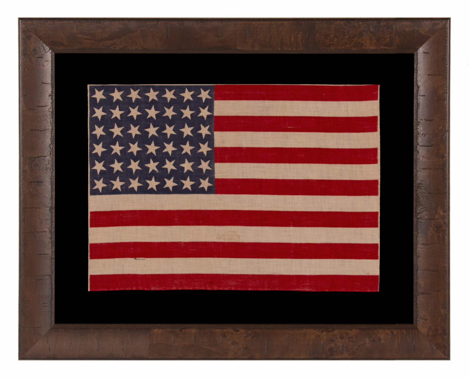 42 STARS ON AN ANTIQUE AMERICAN FLAG WITH SCATTERED STAR POSITIONING, REFLECTS THE ADDITION OF WASHINGTON STATE, MONTANA, AND THE DAKOTAS, NEVER AN OFFICIAL STAR COUNT, circa 1889-1890