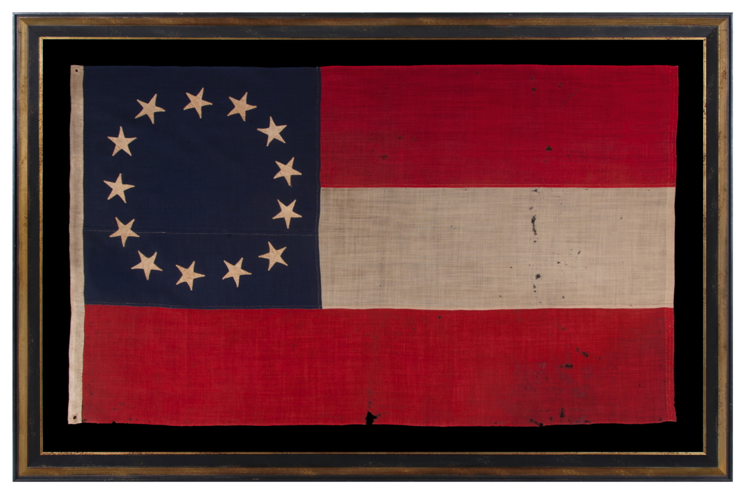 CONFEDERATE 1st NATIONAL PATTERN COMPANY FLAG (A.K.A., "STARS & BARS"), CARRIED BY THE “GRIMES COUNTY GREYS,” FORMALLY DESIGNATED “G” COMPANY OF THE 4th TEXAS INFANTRY, INTEGRAL TO HOOD’S FAMOUS “TEXAS BRIGADE,” ARMY OF NORTHERN VIRGINIA; ATTRIBUTED TO FLAG MAKER HENRY CASSIDY OF NEW ORLEANS; SENT TO THE FAMILY OF SGT. JAMES L. GOULD IN 1863, FOLLOWING HIS DEATH AT LITTLE ROUND TOP, GETTYSBURG