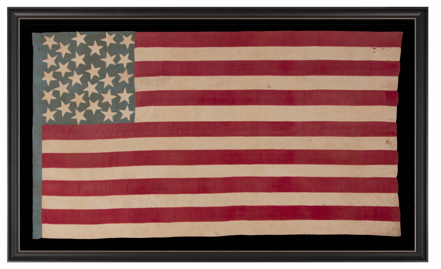 28 STAR, HOMEMADE, ANTIQUE AMERICAN FLAG WITH A CORNFLOWER BLUE CANTON RESTING ON THE “BLOOD” STRIPE; REFLECTS THE ADDITION OF TEXAS ON DEC. 29th, 1845; MEXICAN-WAR ERA; ONE OF THE RAREST STAR COUNTS OF THE 19th CENTURY, OFFICIAL FOR JUST ONE YEAR (1846-47); THE COMPLEMENT OF 14 STRIPES DISPLAYS NATIONAL DISUNION, REFLECTING ALL OF THE SLAVE-HOLDING STATES SAVE DELAWARE, WHERE THE INSTITUTION HAD BEEN DWINDLING FOR DECADES & POLITICIANS COULD NOT BE TRUSTED TO VOTE WITH A UNIFIED BLOC