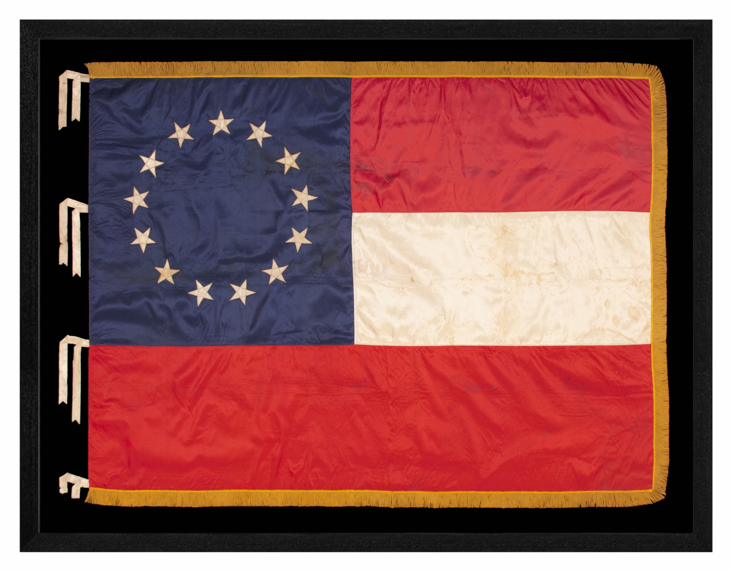 FIRST NATIONAL PATTERN CONFEDERATE FLAG WITH 13 STARS TO INCLUDE MISSOURI AND KENTUCKY SECESSION, MADE ENTIRELY OF SILK, WITH SILK FRINGE AND TIES, A REUNION ERA EXAMPLE, CIRCA 1895-1920
