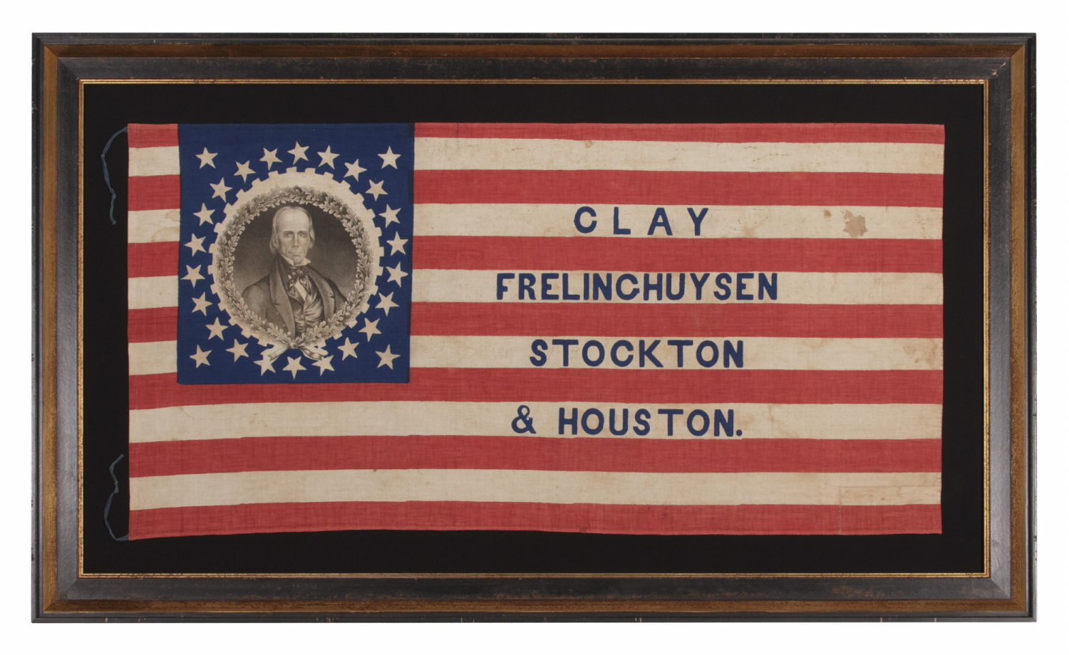 26 STAR AMERICAN PARADE FLAG, MADE FOR THE 1844 PRESIDENTIAL CAMPAIGN OF HENRY CLAY AND THEODORE FREYLINGHUYSEN, WITH CLAY’S PORTRAIT SET WITHIN AN OAK LEAF & GEAR COG MEDALLION AND THE RARE PRESENCE OF COATTAIL CANDIDATES STOCKTON & HOUSTON