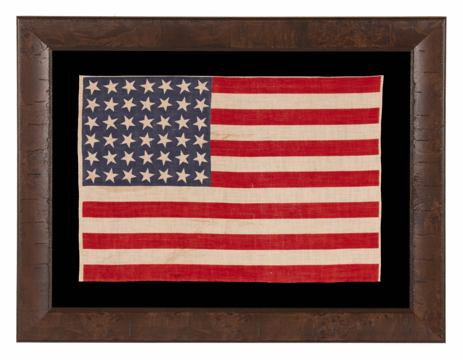 42 STARS ON AN ANTIQUE AMERICAN FLAG WITH SCATTERED STAR POSITIONING, REFLECTS THE ADDITION OF WASHINGTON STATE, MONTANA, AND THE DAKOTAS, NEVER AN OFFICIAL STAR COUNT, circa 1889-1890