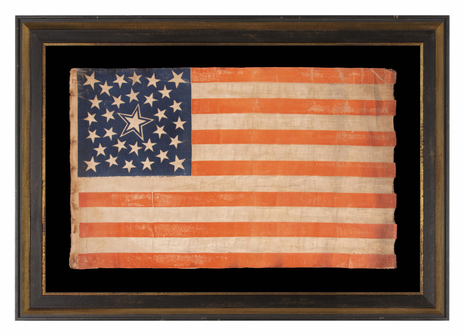 31 STARS ON AN ANTIQUE AMERICAN FLAG OF THE PRE-CIVIL WAR ERA, WITH A DOUBLE-WREATH STYLE MEDALLION CONFIGURATION THAT FEATURES A LARGE, HALOED CENTER STAR; REFLECTS THE PERIOD WHEN CALIFORNIA WAS THE MOST RECENT STATE TO JOIN THE UNION, 1850-1858