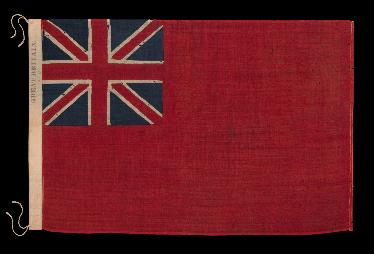 RARE BRITISH RED ENSIGN OF THE LATTER 19TH CENTURY, MADE BY HORSTMANN & BROTHERS COMPANY OF PHILADELPHIA FOR DISPLAY AT THE 1876 CENTENNIAL INTERNATIONAL EXHIBITION, ONE OF TWO KNOWN EXAMPLES