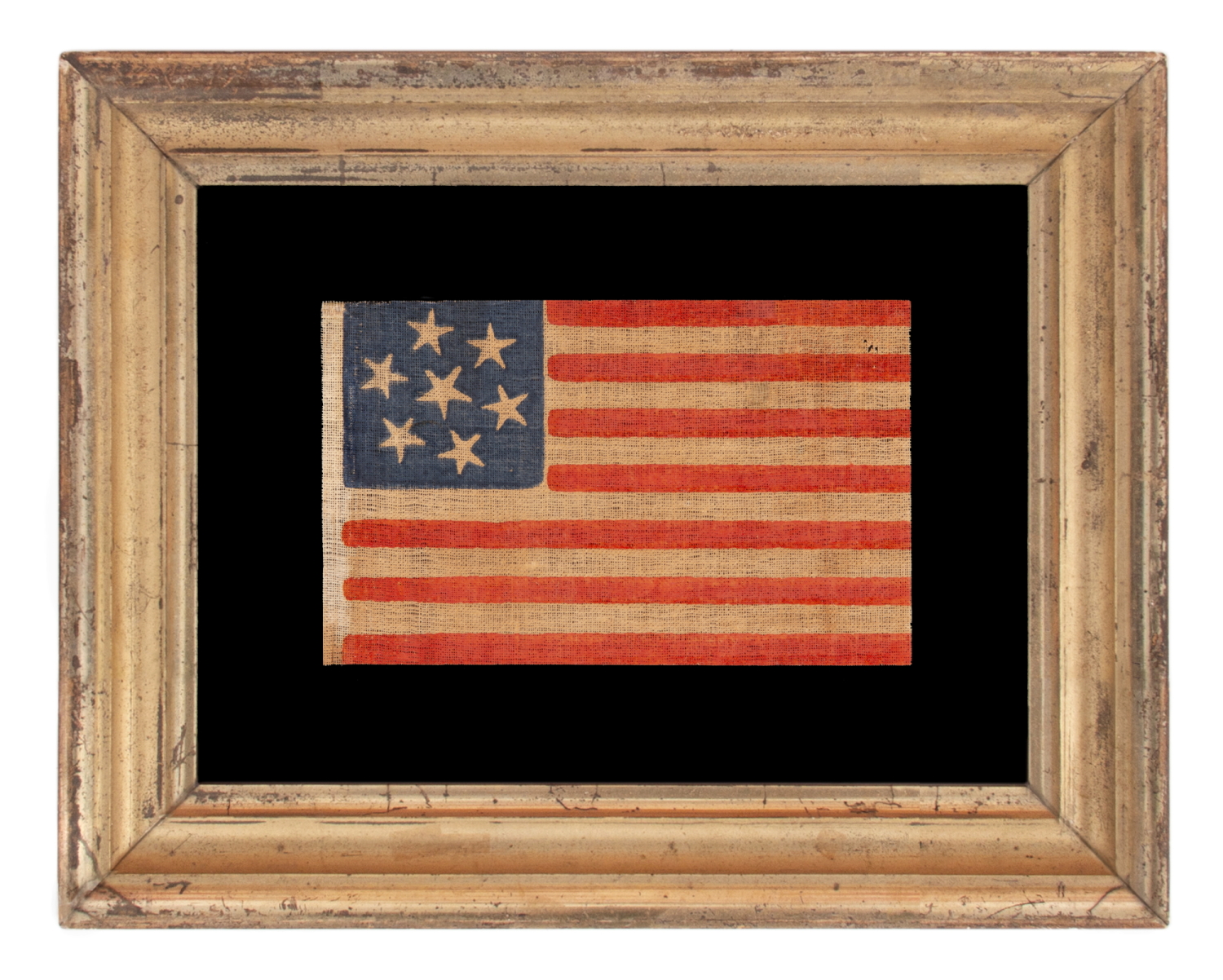 7 STARS WITH WHIMSICAL PROFILES ON AN ANTIQUE AMERICAN PARADE FLAG, MADE TO REFLECT THE INITIAL WAVE OF 7 STATES SECEDED FROM THE UNION, A CIVIL WAR PERIOD EXAMPLE, THE LARGEST OF SEVERAL KNOWN VARIETIES, MADE circa 1861