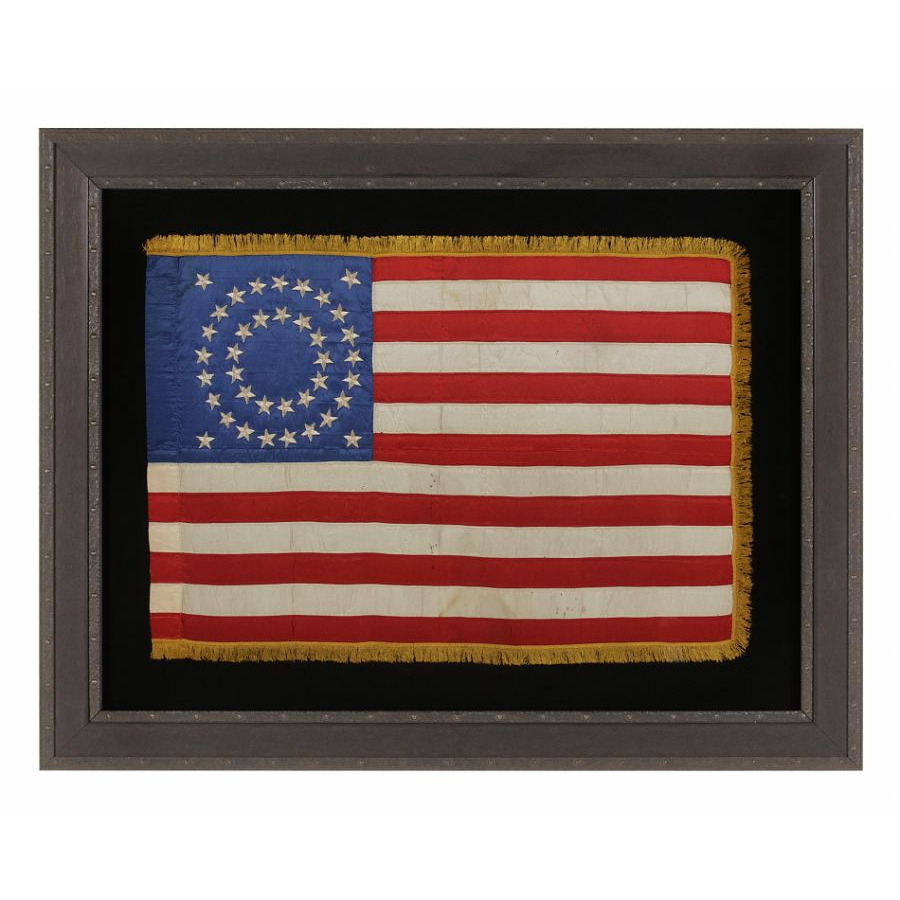 RARE & BEAUTIFUL 38 STAR ANTIQUE AMERICAN FLAG, AN INDIAN WAR PERIOD MILITARY GUIDON, MADE OF SILK AND ENTIRELY HAND-SEWN, WITH EMBROIDERED STARS IN A MEDALLION CONFIGURATION, 1876-1889, COLORADO STATEHOOD