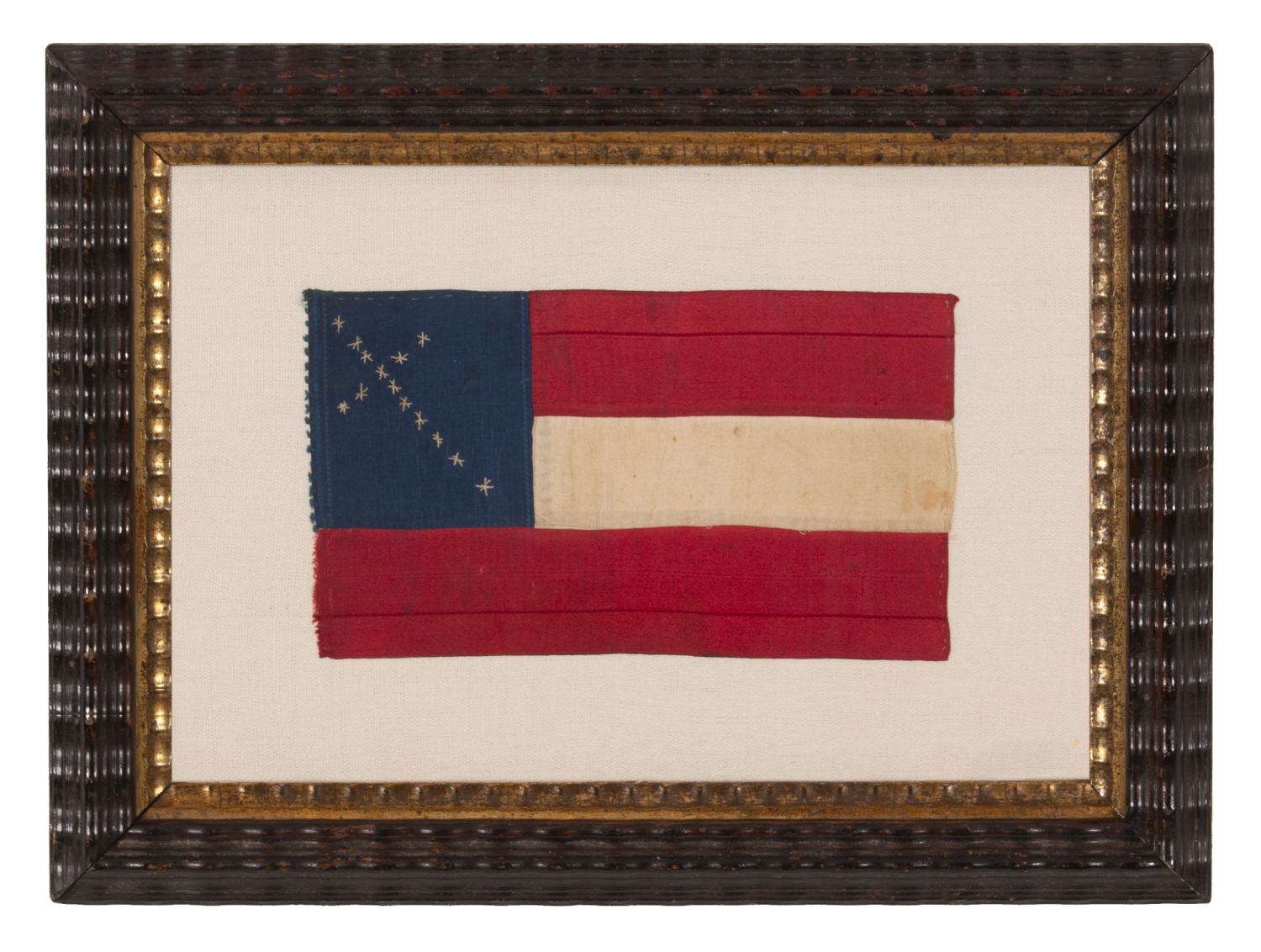 EXTRAORDINARY CONFEDERATE BIBLE FLAG IN THE FIRST NATIONAL FORMAT, MADE OF SILK RIBBON, WITH 14 EMBROIDERED STARS ARRANGED IN THE FORM OF A CANTED CHRISTIAN CROSS; ONE OF JUST THREE KNOWN EXAMPLES WITH A VARIANT OF THIS MAGNIFICENT STAR FORMATION