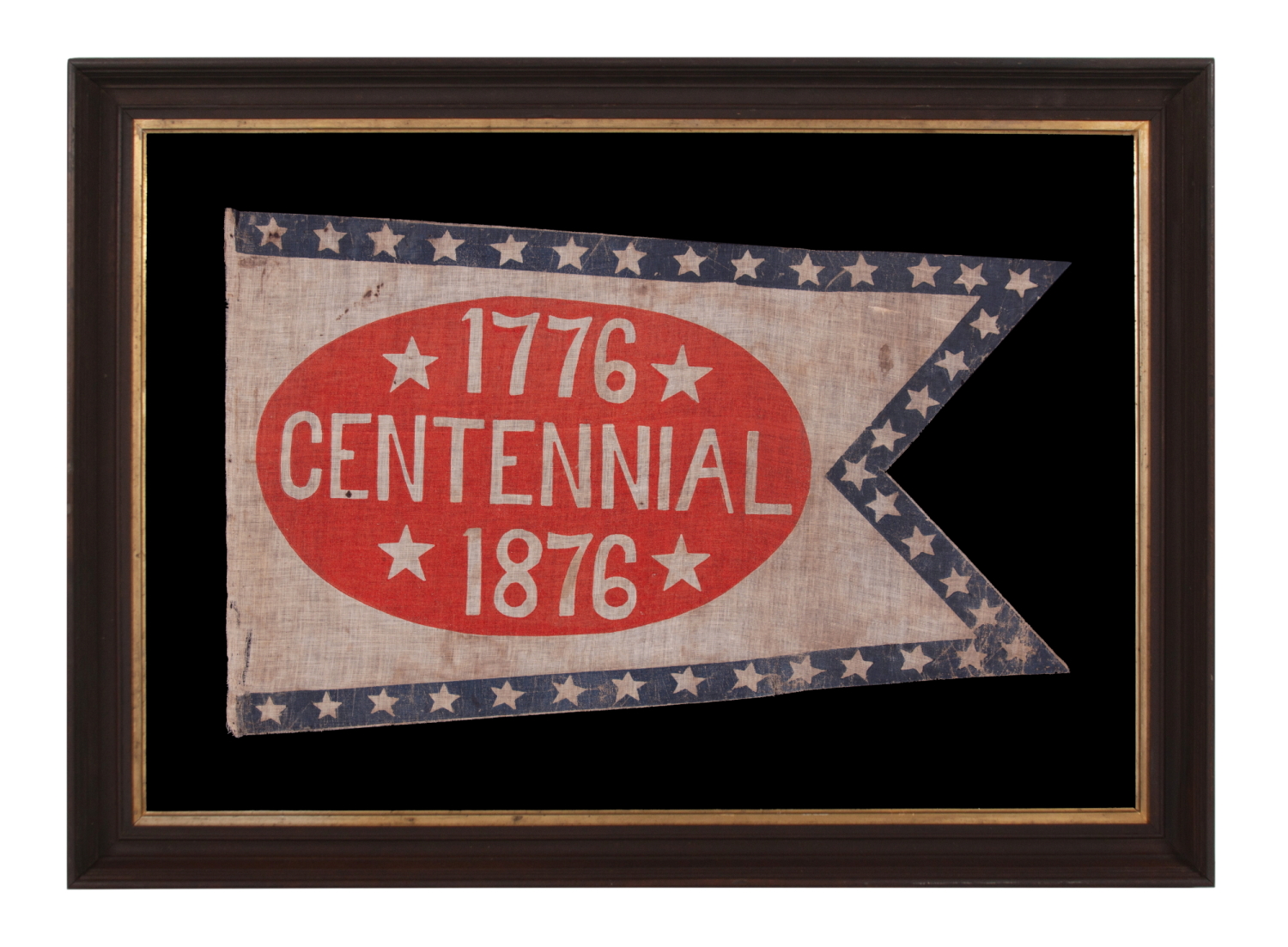 SWALLOW-TAILED PARADE FLAG / PENNANT WITH “1776 CENTENNIAL 1876” SET WITHIN A SUNBURNT, RED-ORANGE, EGG-SHAPED WINDOW, WITHIN A BLUE BORDER WITH 37 STARS; AN EXTREMELY RARE EXAMPLE, MADE TO CELEBRATE THE 100-YEAR ANNIVERSARY OF AMERICAN INDEPENDENCE