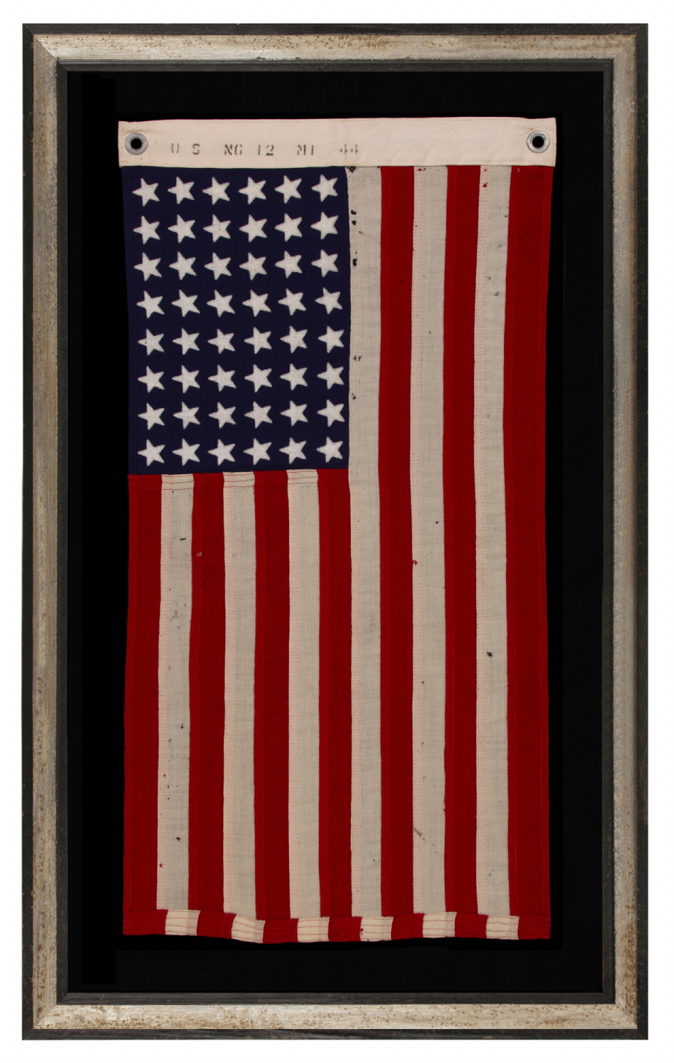 48 STAR, U.S. NAVY SMALL BOAT ENSIGN, MADE AT MARE ISLAND, CALIFORNIA DURING WWII, SIGNED AND DATED 1944, IN THE SMALLEST SCALE EMPLOYED AT THE TIME