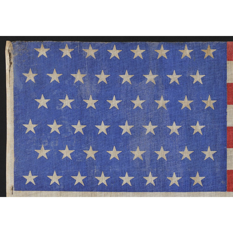 48 STARS IN STAGGERED ROWS ON A LARGE SCALE PARADE FLAG WITH A ...